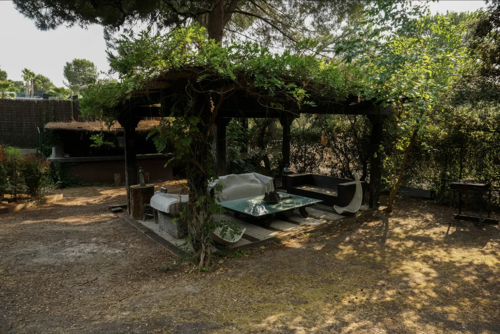 Outdoor pergola with seating area